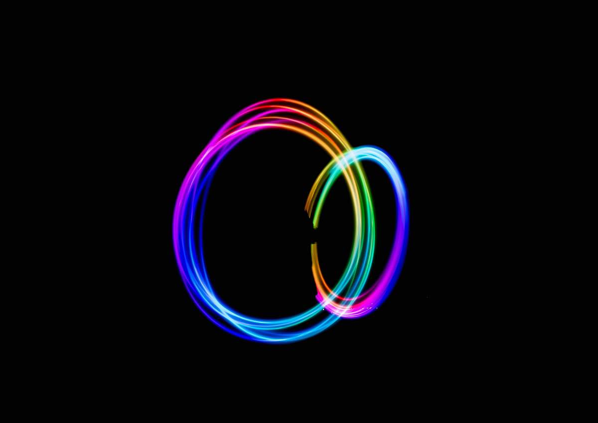 black wallpapers time-lapse photography of person doing circle rainbow light light
